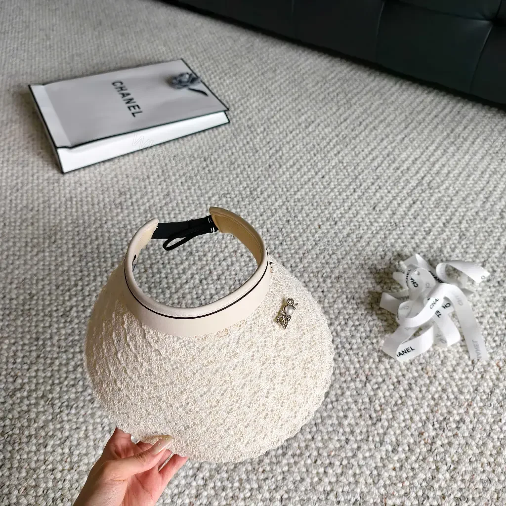 View 2 of Cream Boucle Round Handbag with Gold DIOR Accent
