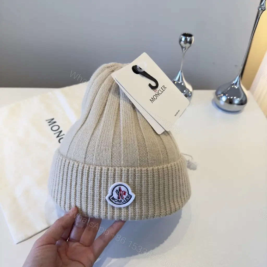 View 6 of Beige Ribbed Knit Beanie – Luxury, Signature Patch, Everyday Style