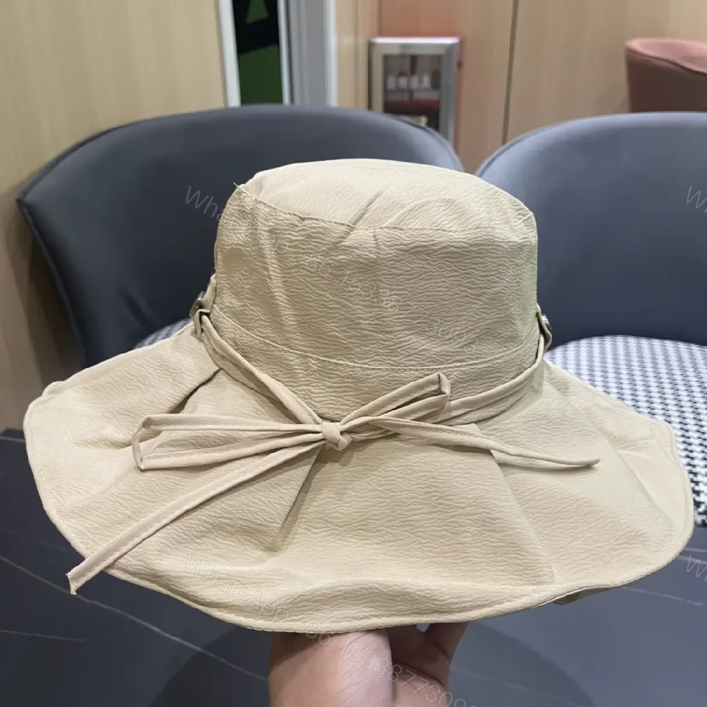 View 12 of Beige Textured Bucket Hat with Emblem, Everyday Luxury