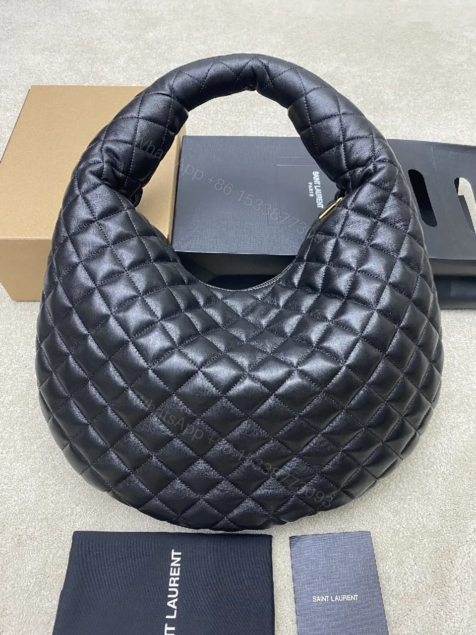 View 8 of Quilted Leather Hobo Bag with Gold Hardware Emblem