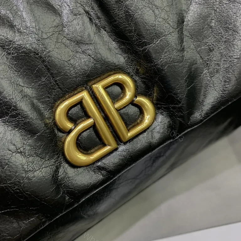 View 6 of Chic Black Leather Shoulder Bag with Gold Chain Straps