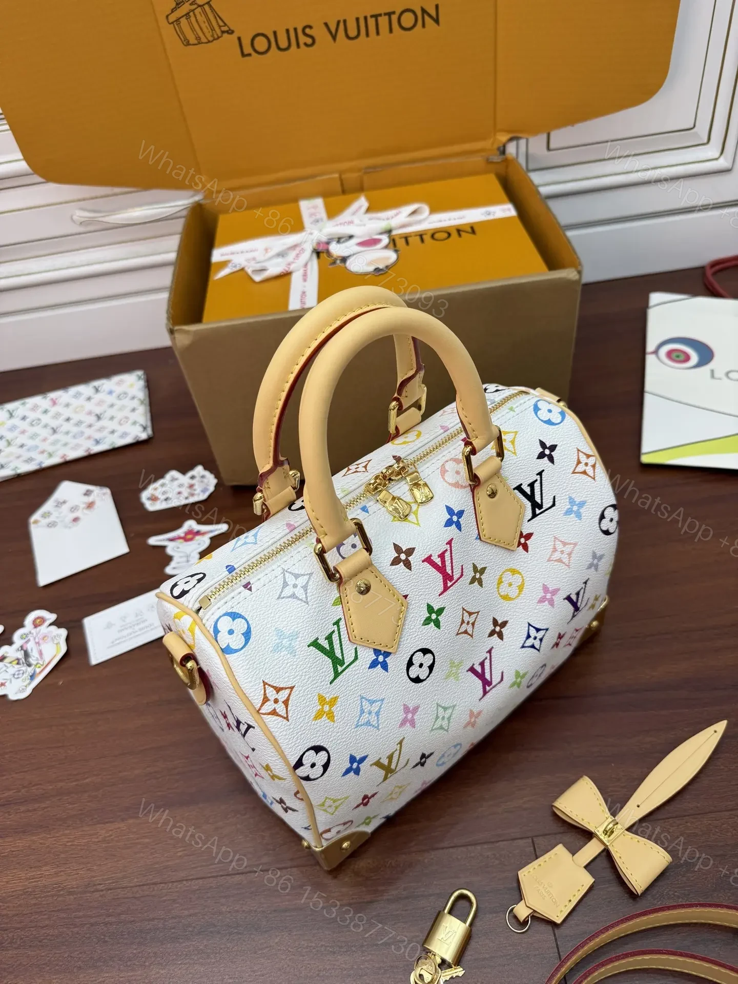 View 2 of Louis Vuitton x Takashi Murakami Monogram Multicolor Speedy Bandoulière 25