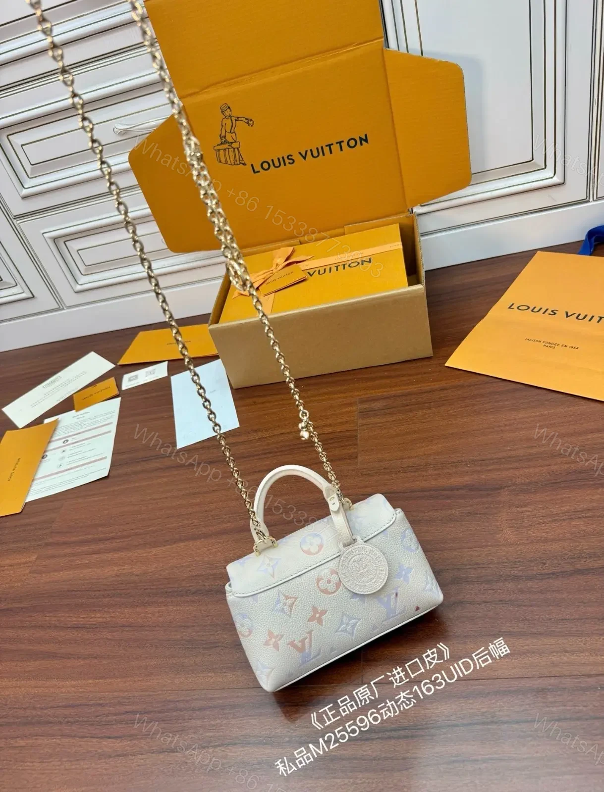 View 5 of Louis Vuitton Nano Madeleine Handbag