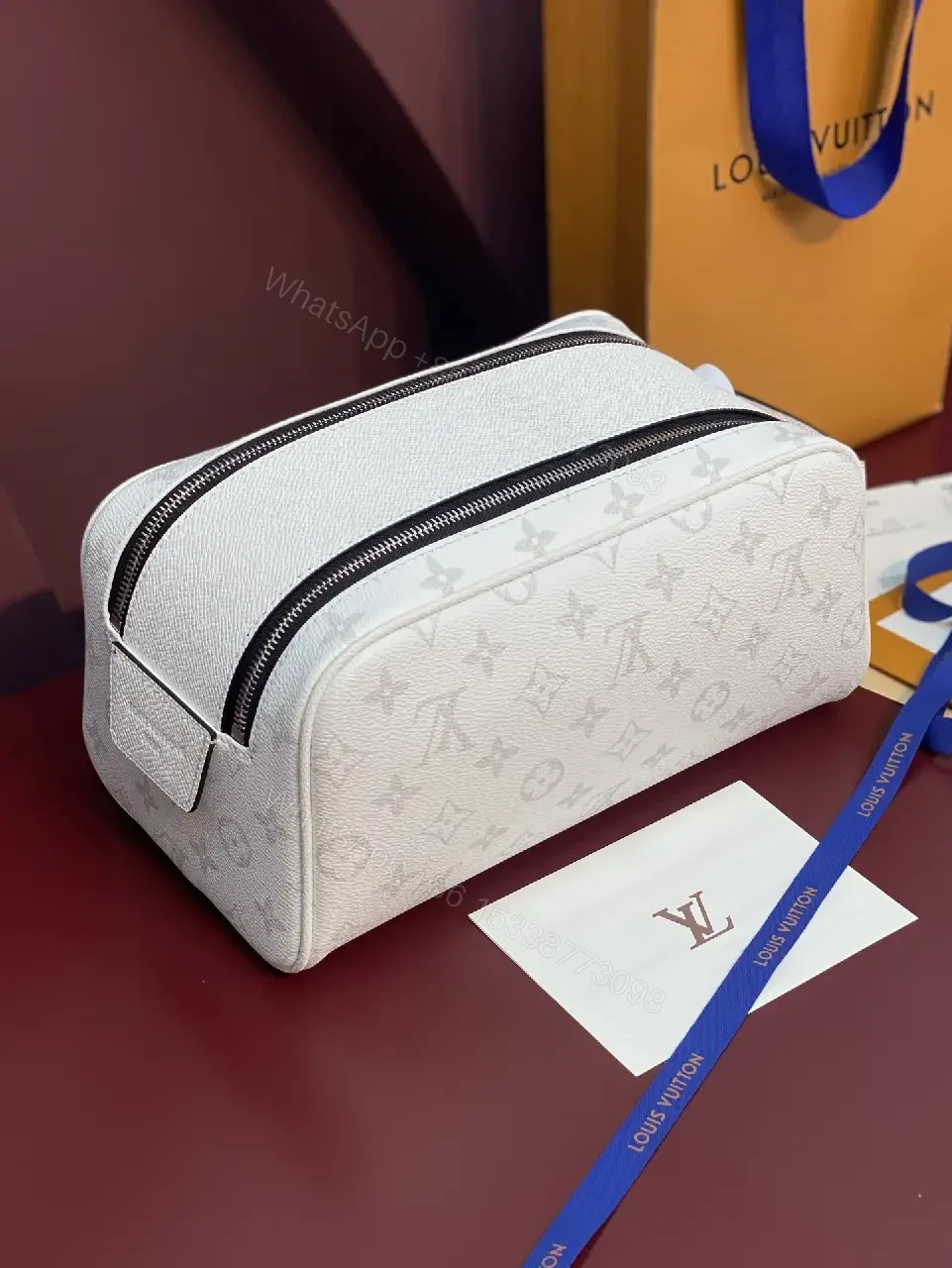 View 7 of White Leather Monogrammed Subtle LV-inspired Cosmetic Bag