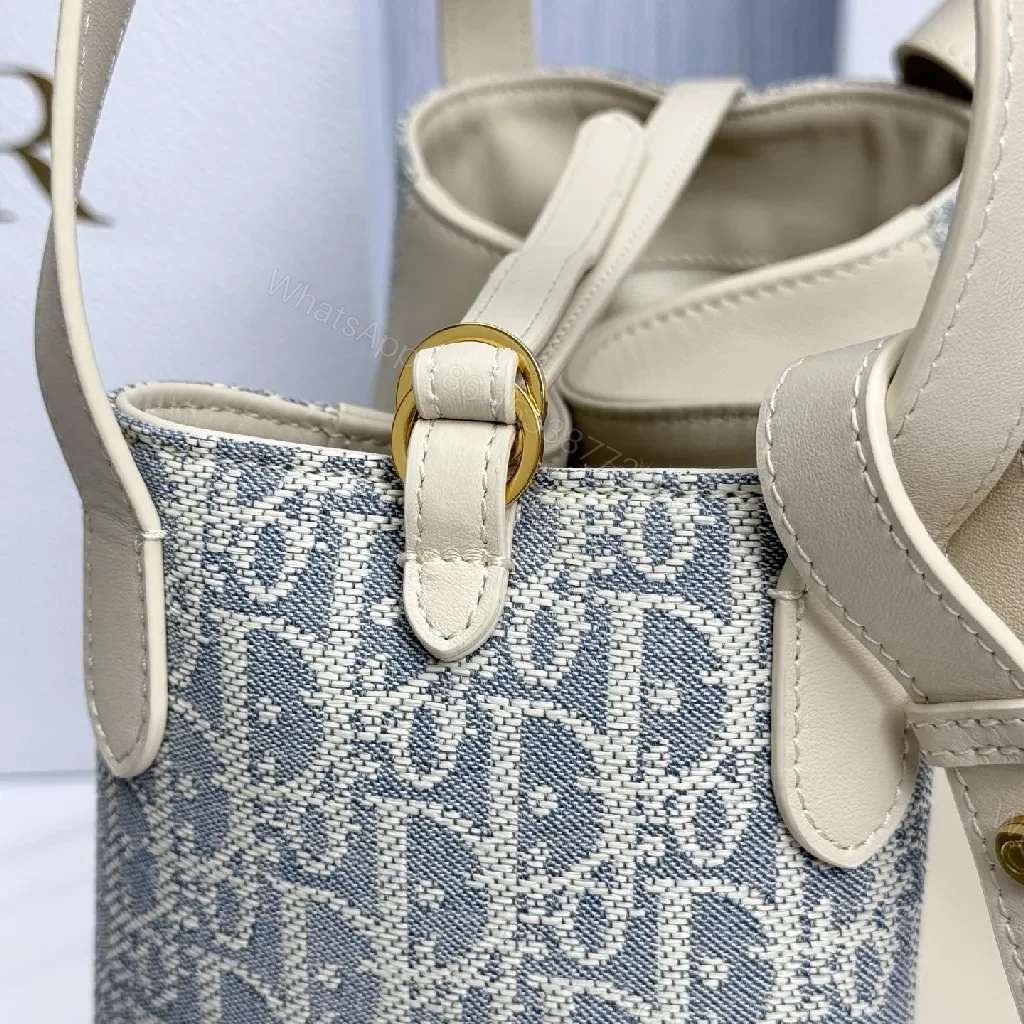 View 4 of Cream Leather & Denim-Inspired Bucket Bag, Structured Luxury