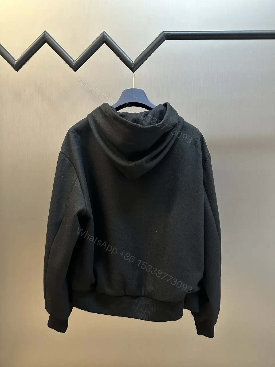View 10 of Black Leatherette Minimal Zip Hoodie with LV Emblem