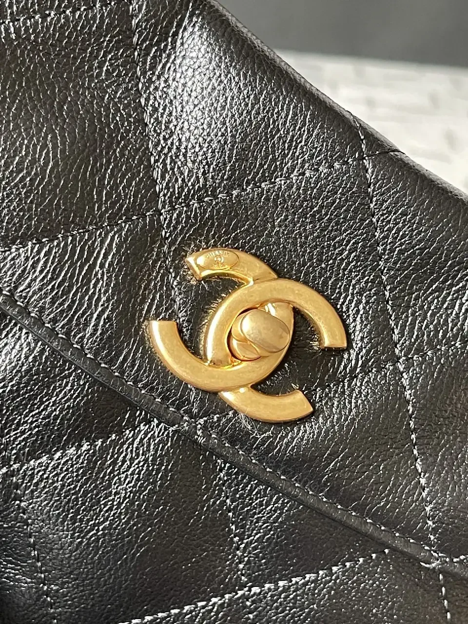 View 7 of Quilted Black Leather Satchel with Gold Chain Accent