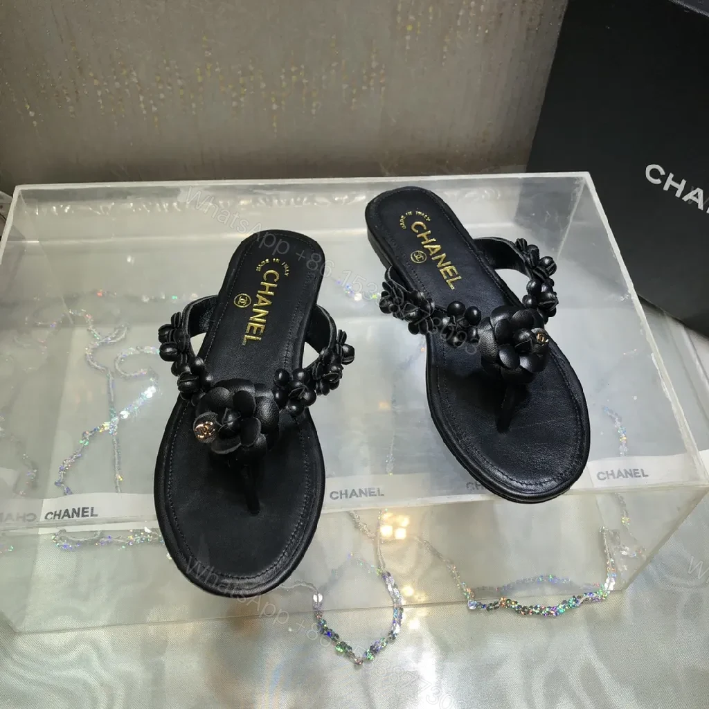 View 2 of Black Leather-Feel Floral Slip-Ons with Luxe Accents