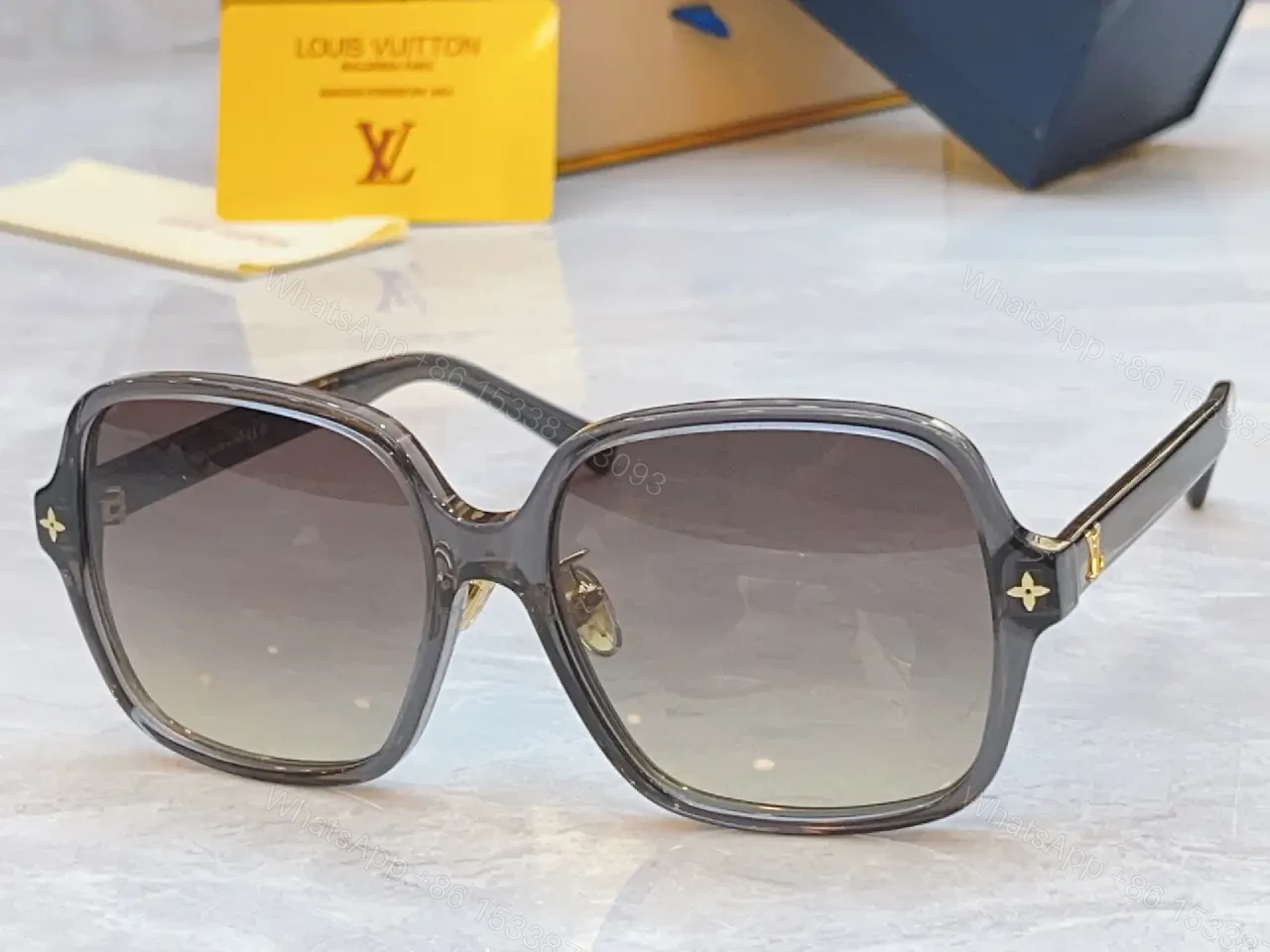 View 4 of Gray Glossy Square Sunglasses Gradient Lenses, Metal Accents, Luxury Style, Louis Vuitton Temples (No Brand Details)
