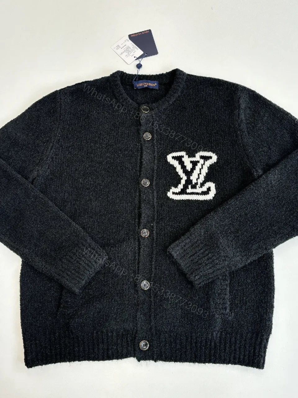 View 10 of Textured Bouclé Knit Cardigan - Subtle LV Logo, Versatile Warmth