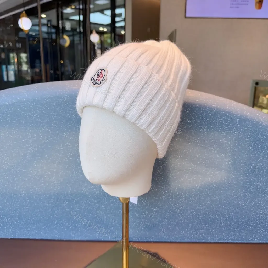 View 6 of Cozy Knit Beanie: Soft Ribbed Warmth, Subtle Emblem, Luxury Style