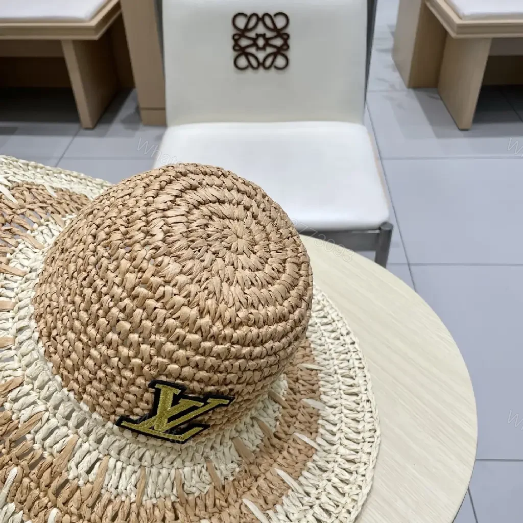 View 2 of Elegant Straw Hat with LV Emblem - Sun-Ready Luxury Hat