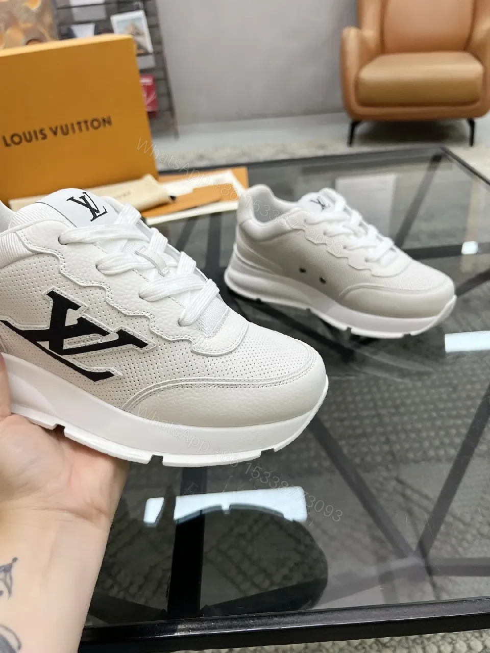 View 3 of White Leather Low-Top Luxury Sneakers with Subtle Logo Detail