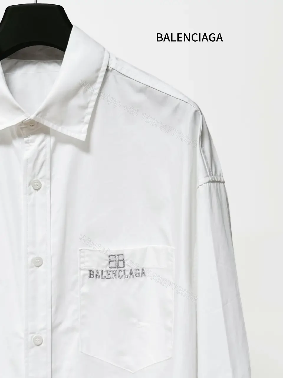 View 10 of Minimalist Button-Front Shirt with Subtle Logo Detail