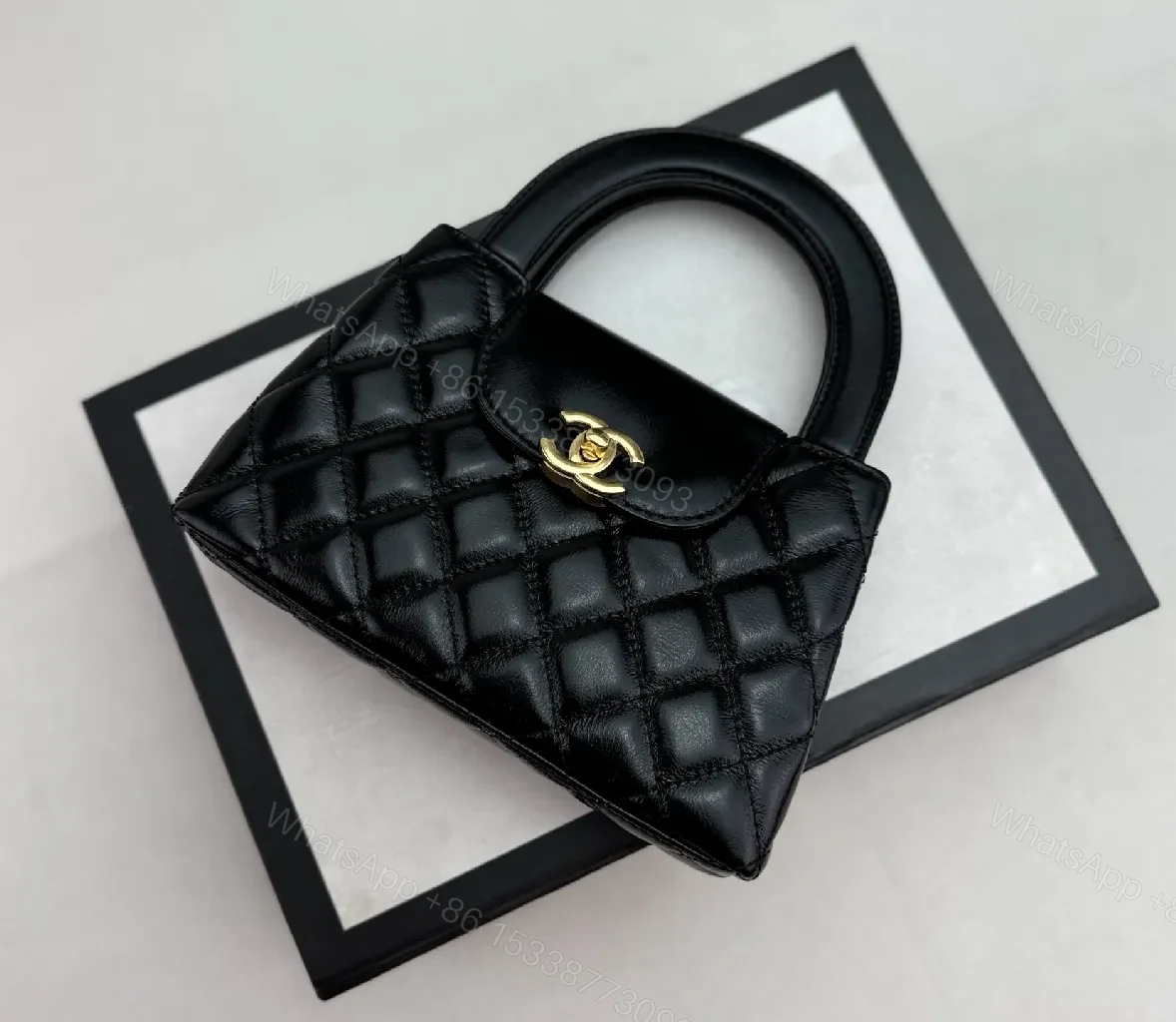 View 9 of Chic Quilted Mini Handbag with Gold Turn-Lock Hardware