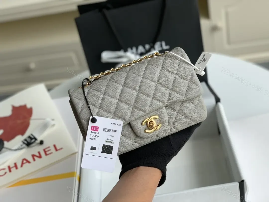 View 3 of Quilted Leather Crossbody: Compact Luxury with Gold Hardware