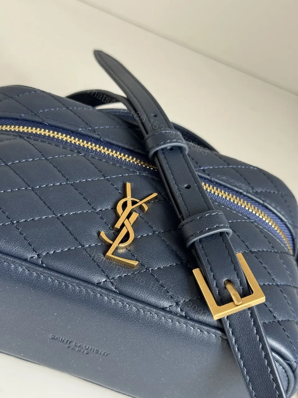View 3 of Navy Quilted Leather Crossbody Bag with Gold Hardware