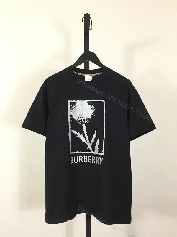 Minimalist Black Cotton Tee with Graphic Burberry-Inspired Emblem — view 1