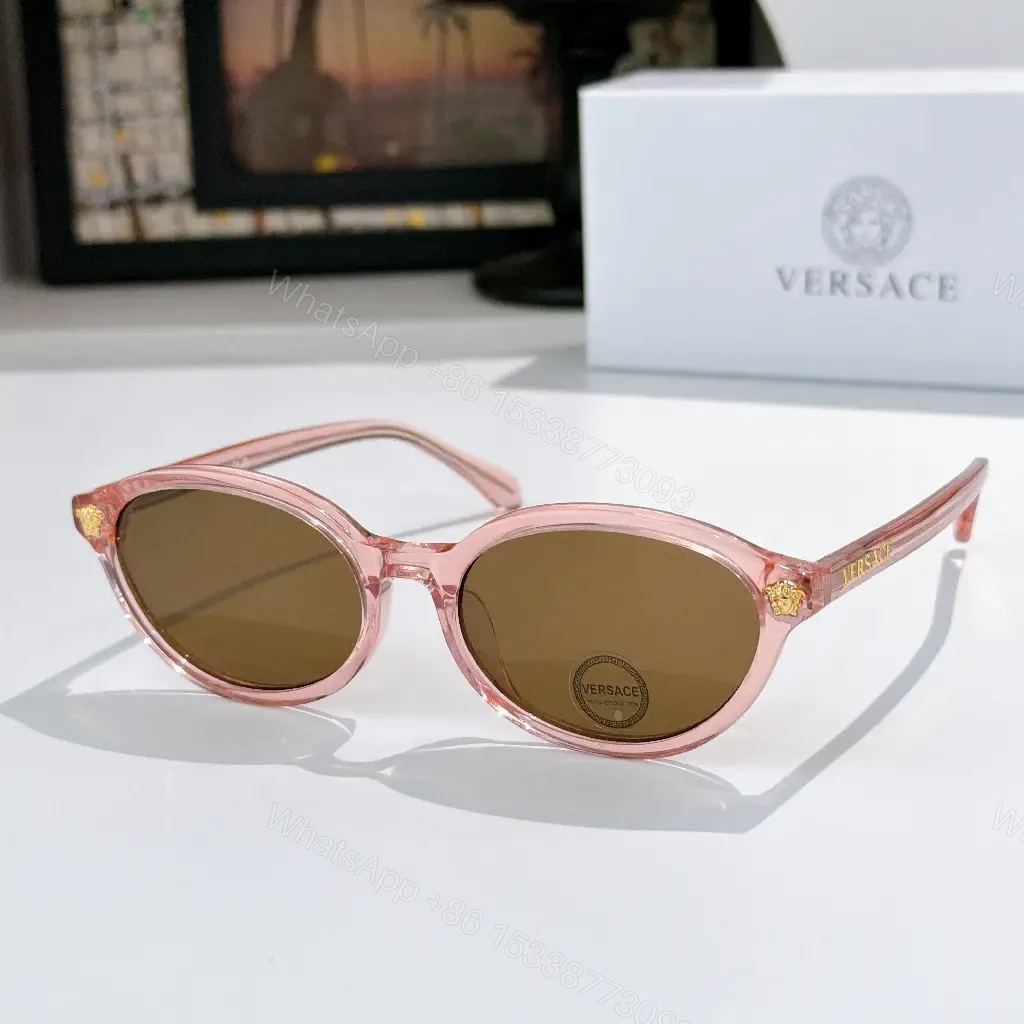 View 9 of Tortoiseshell Round-Frame Sunglasses with Gold Crest Accents