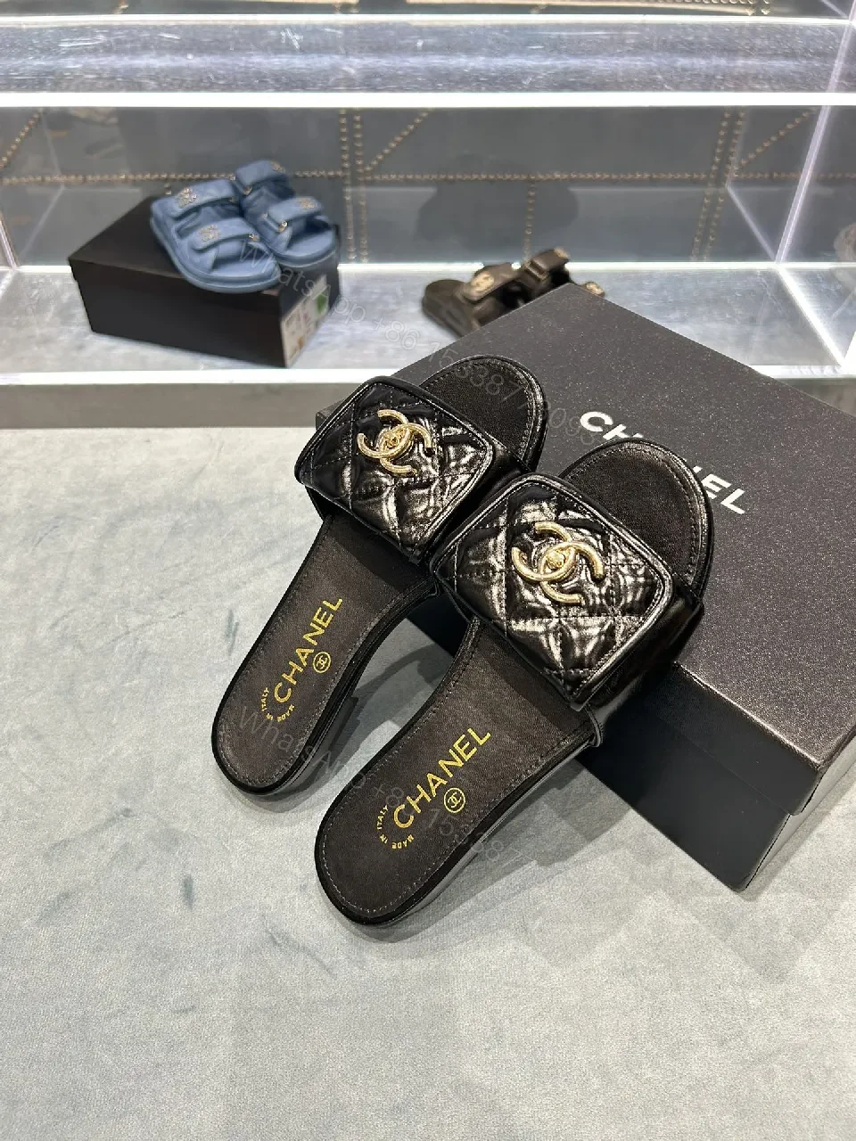 View 2 of Black Quilted Leather Slide with Gold Logo Escort