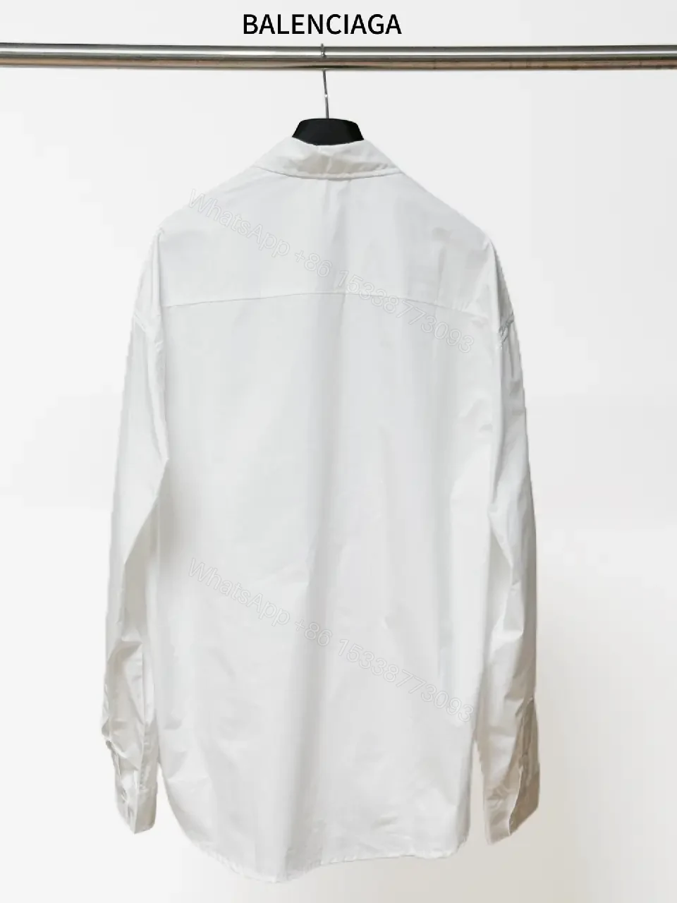 View 6 of Minimalist Button-Front Shirt with Subtle Logo Detail