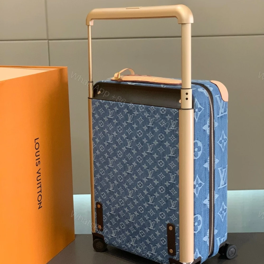 View 3 of Louis Vuitton Horizon 55 Suitcase Monogram Cotton Canvas Denim Blue 55Cm M24314