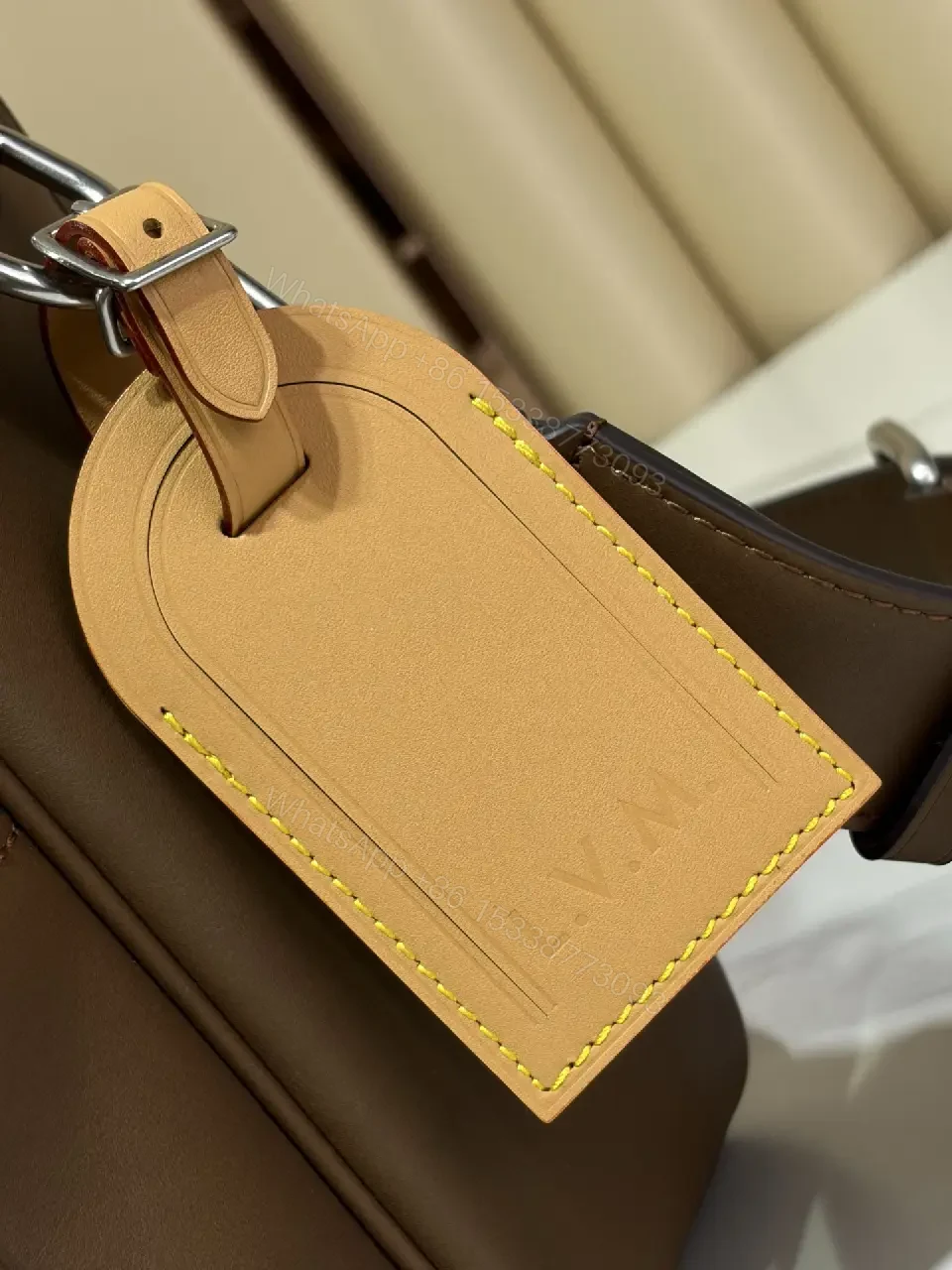 View 8 of Brown Leather Minimalist Messenger Bag with Subtle Stitching Details