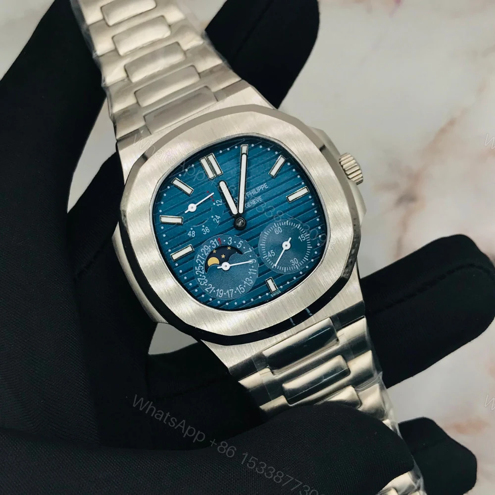 Patek Philippe Nautilus Moon Phase Blue Striped Dial Steel — view 1