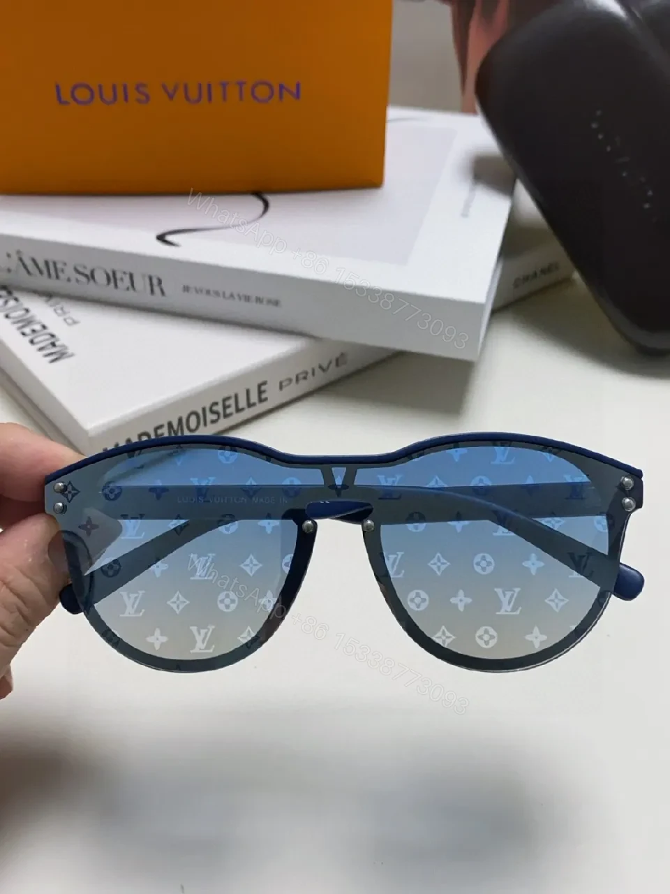 View 10 of Blue Translucent Monogram Shield Sunglasses - Oversized, UV-safe, Light-Weight Acetate