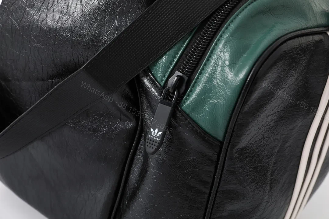 View 2 of Bold Black-Emerald Contrast Weekender, Iconic Three-Stripes Finish