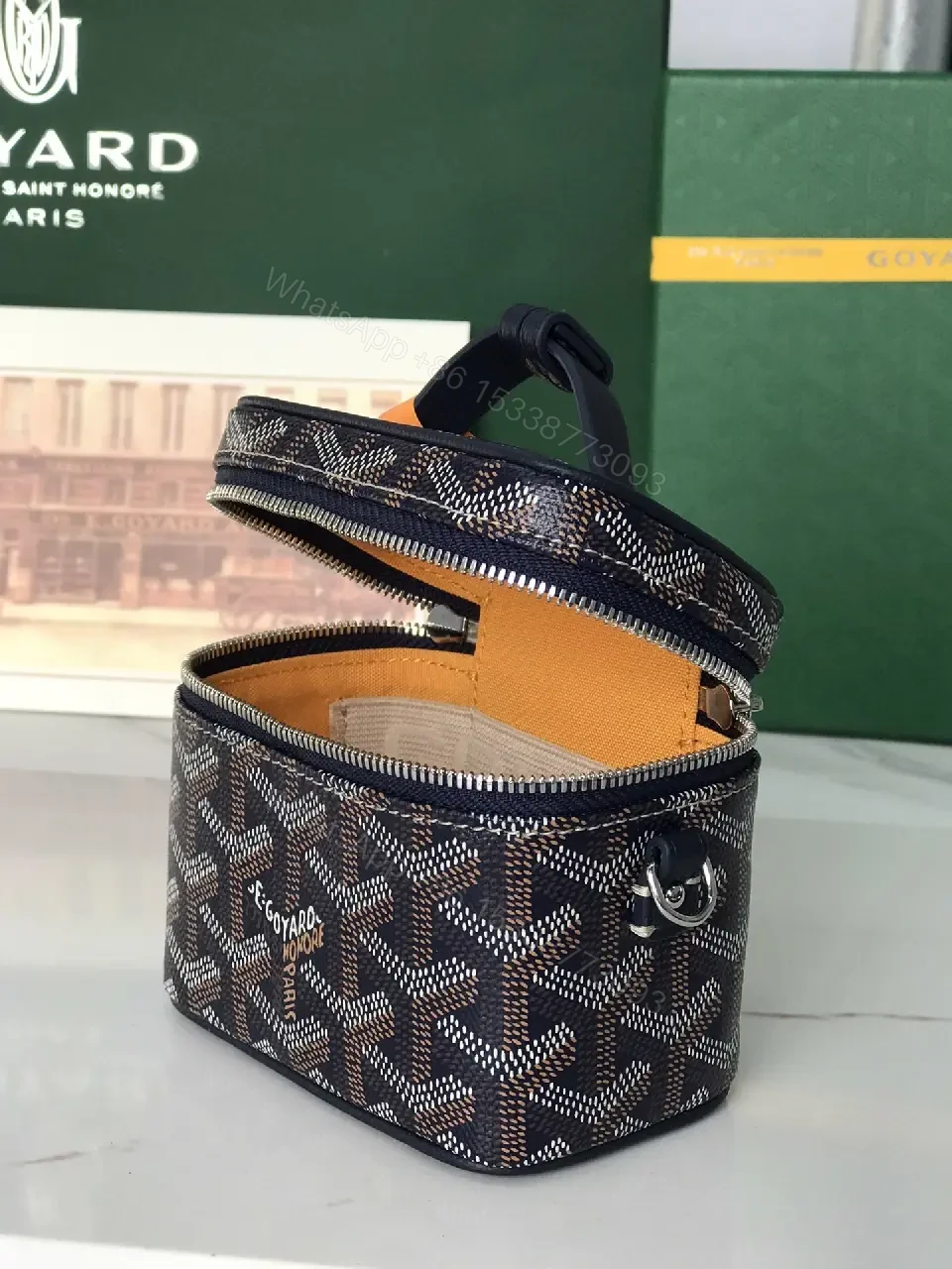 View 8 of Colorful coated-canvas pouch with distinctive pattern, compact design, durable, luxury vibe