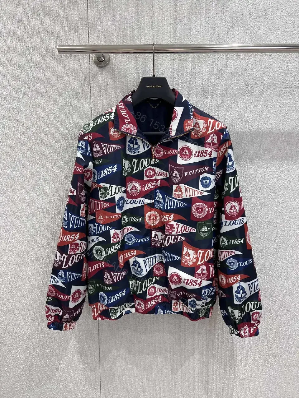 Bold Patterned Zip Jacket: Logo Motif Luxury Streetwear — view 1
