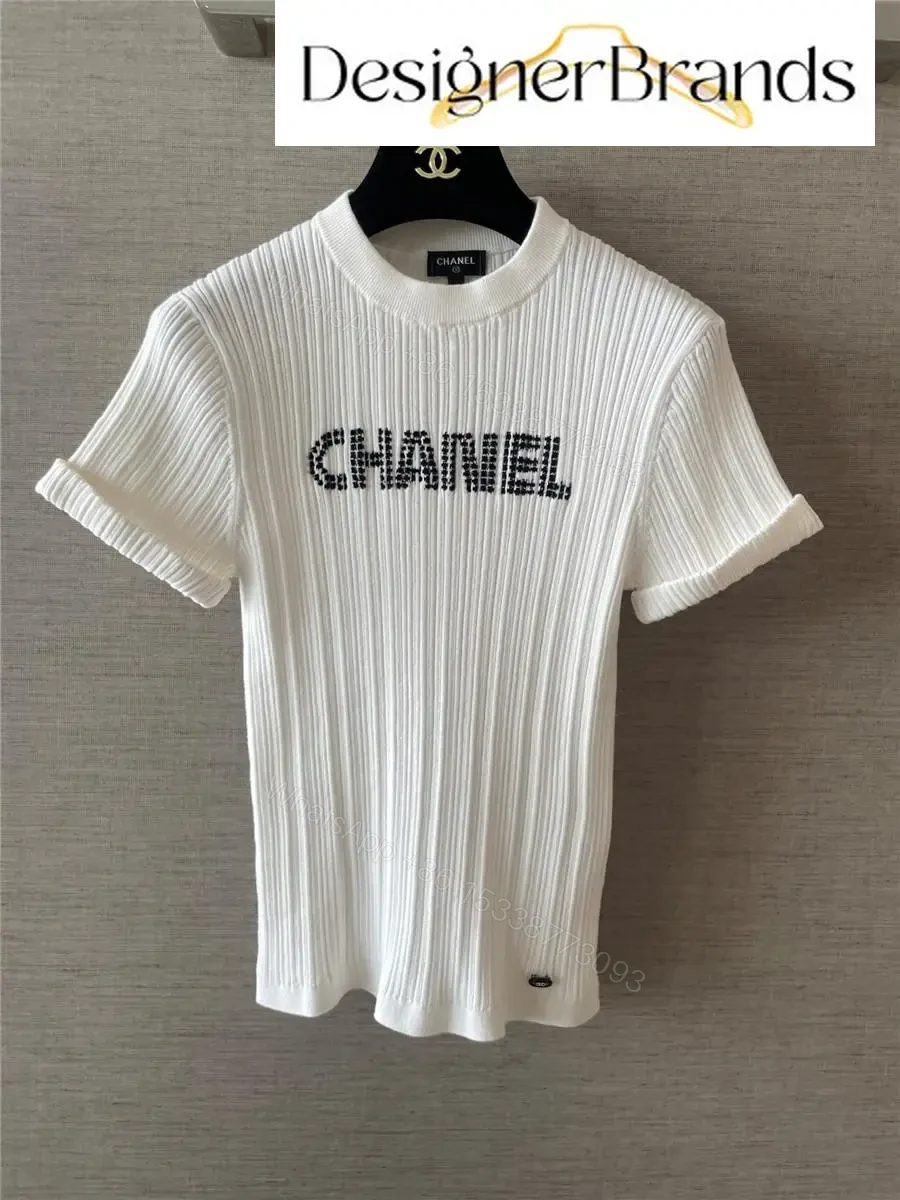 View 3 of White Knit Tee with Logo Embellishment – Elevated Texture, Modern Luxury