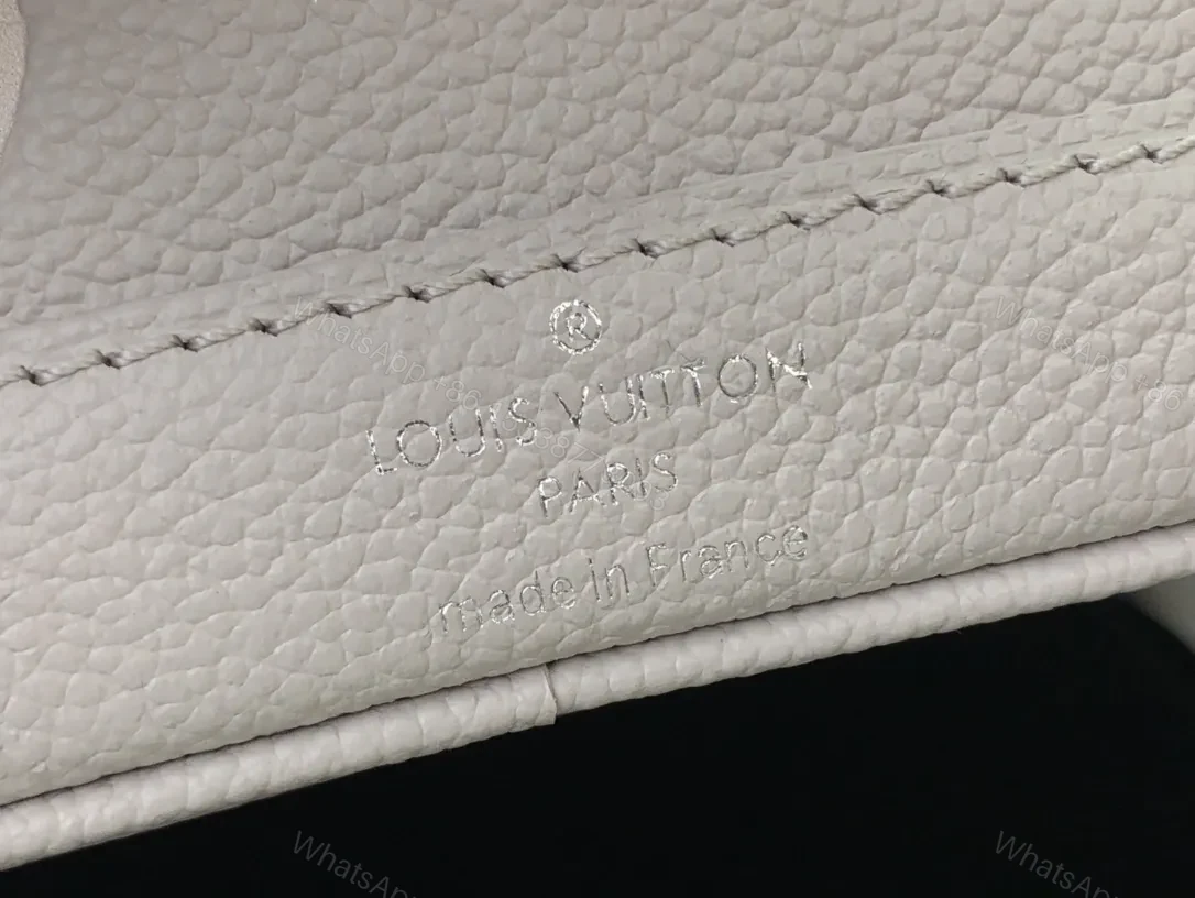 View 9 of Soft-Shadow Monogram Bucket Bag: Modern Texture, Subtle Luxury