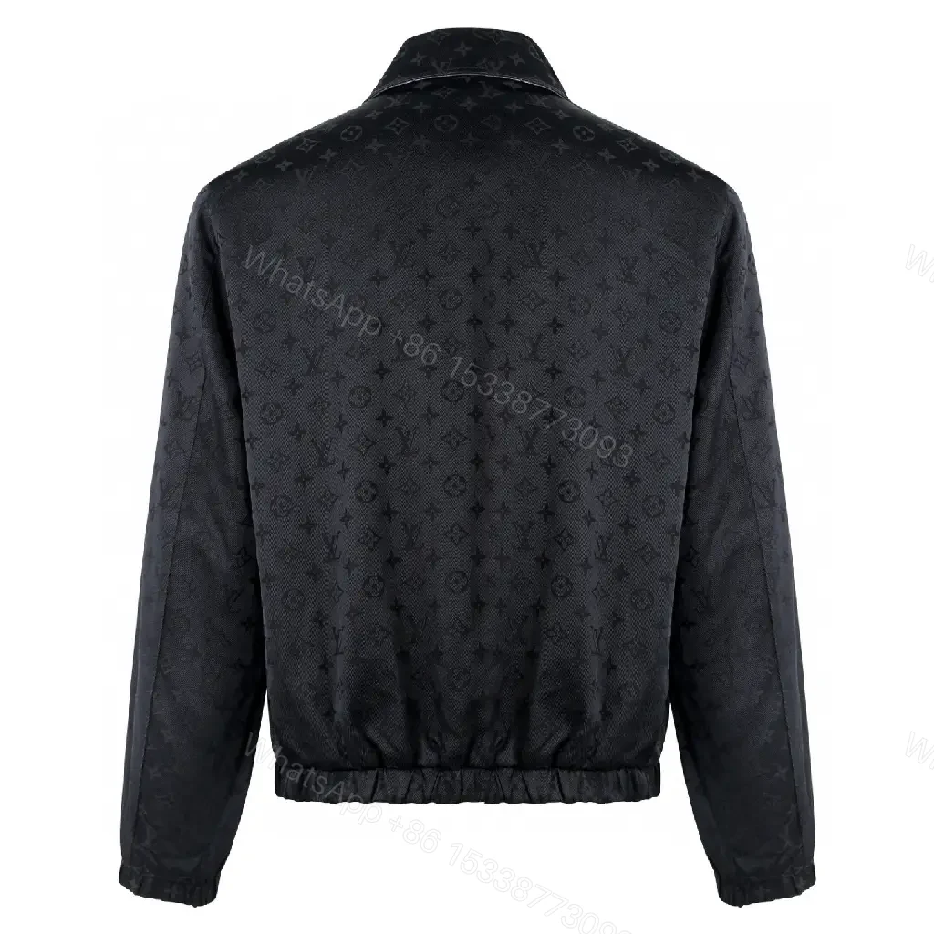 View 3 of Black Leather-Trim Coach Jacket with Subtle Logo Embroidery