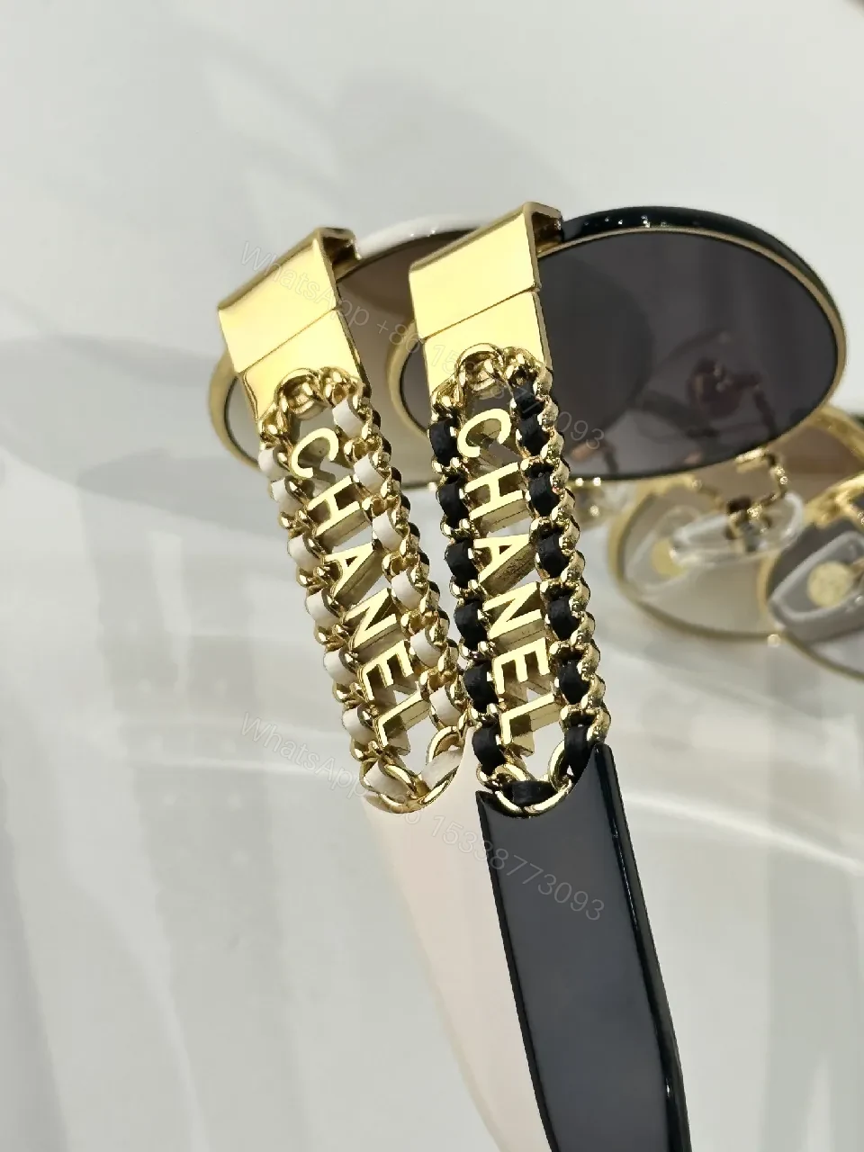 View 7 of Gold-Accented Round Sunglasses: Minimal Luxury Shield