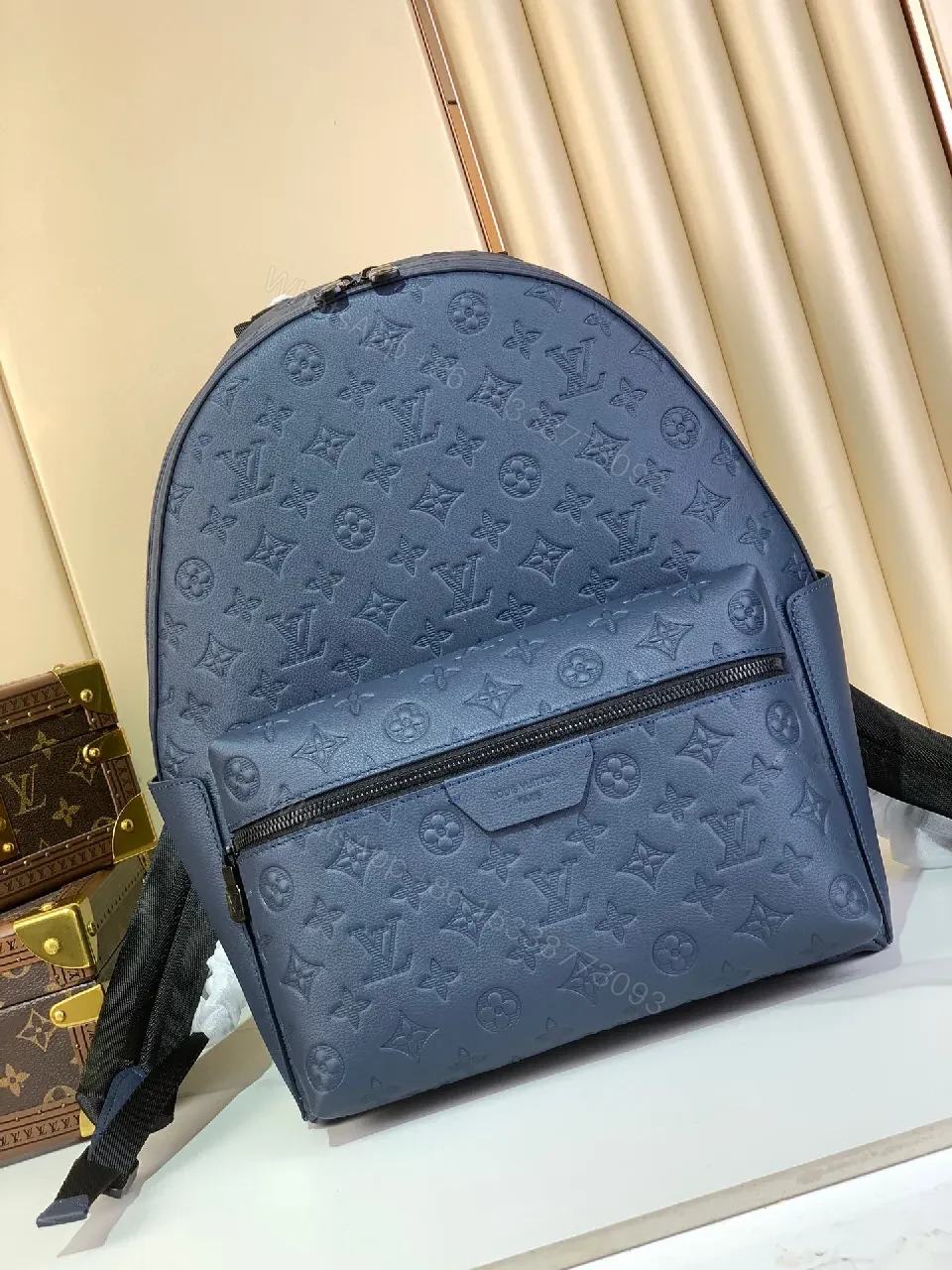 Compact Monogram Backpack: Textured Luxury, Everyday-Ready — view 1