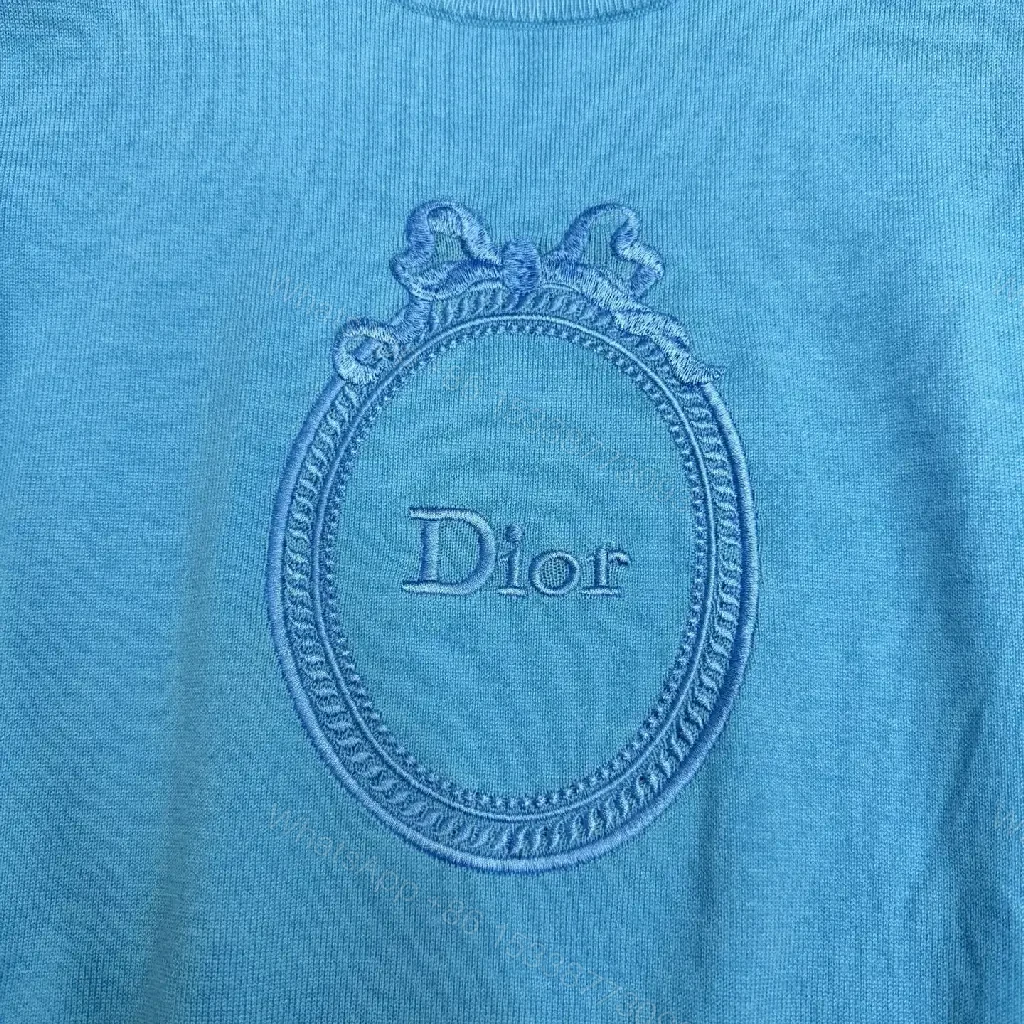 View 11 of Mineral Blue Knit Top with Crest – Elevated Weekend Layer, Mid-Weight