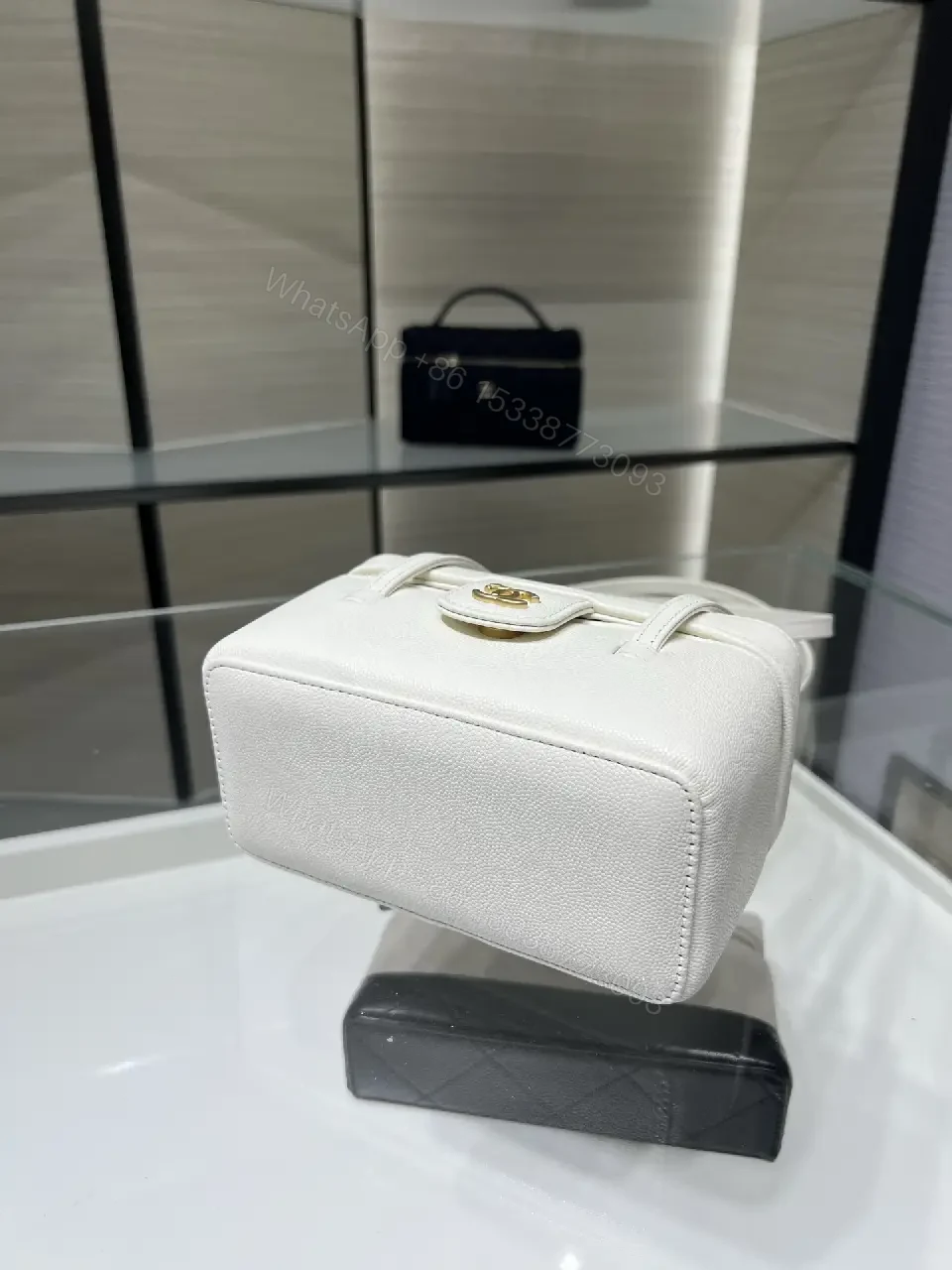 View 5 of Chic Pebbled Leather Compact Handbag - Structured, Versatile, Everyday Elegance