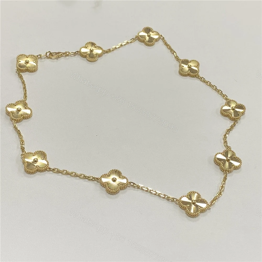 View 2 of Van Cleef Arpels 10 Motif Necklace Guilloche Gold VCARP3JJ00