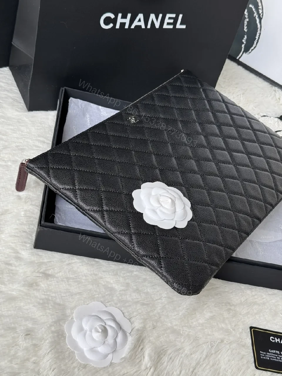View 4 of Compact Black Quilted Leather Clutch with Silver Logo