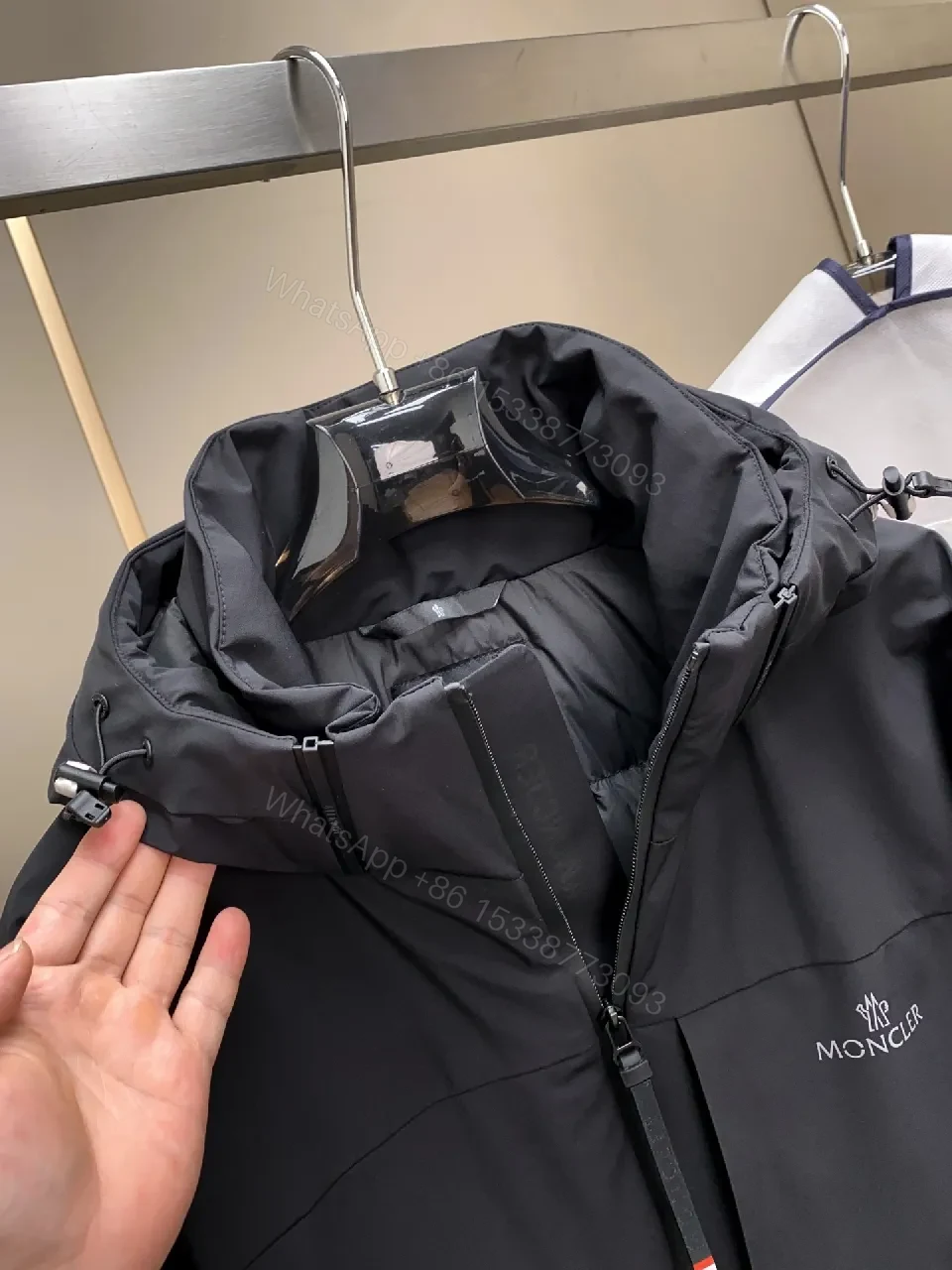 View 9 of Sleek Black Shell Jacket: Urban Utility with Elevated Craft