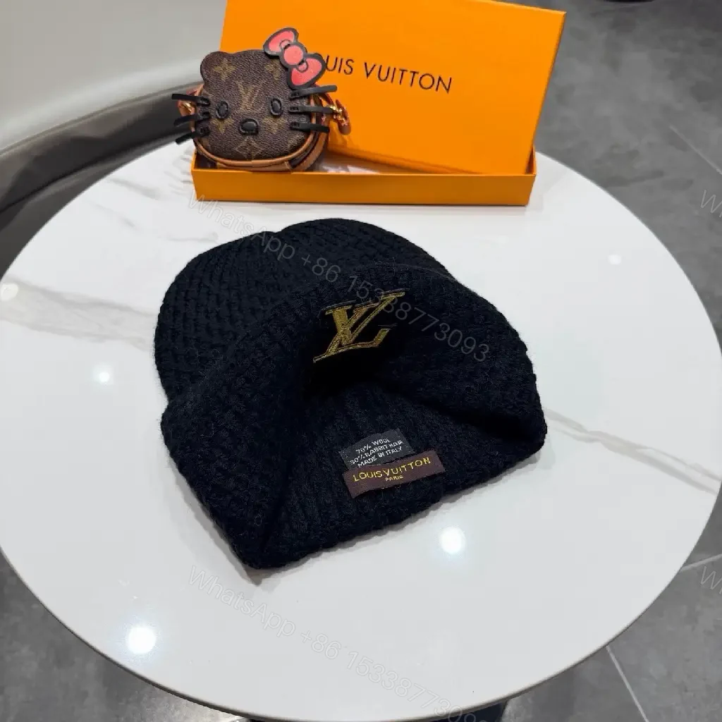 View 3 of Cozy Chic Beanie with Gold LV Emblem — Streetwise Luxury Beanie