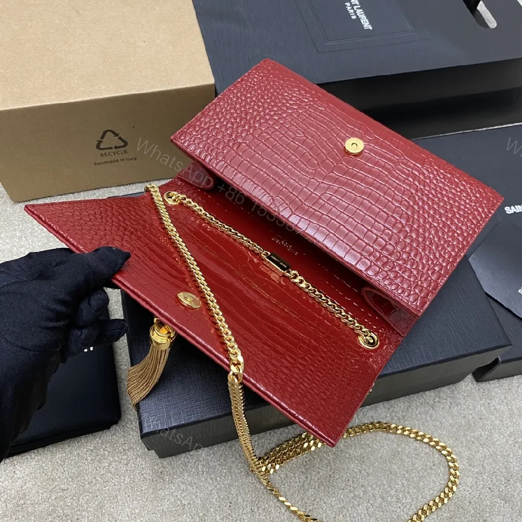 View 3 of Structured Red Leather Clutch with Gold Hardware and Tassel