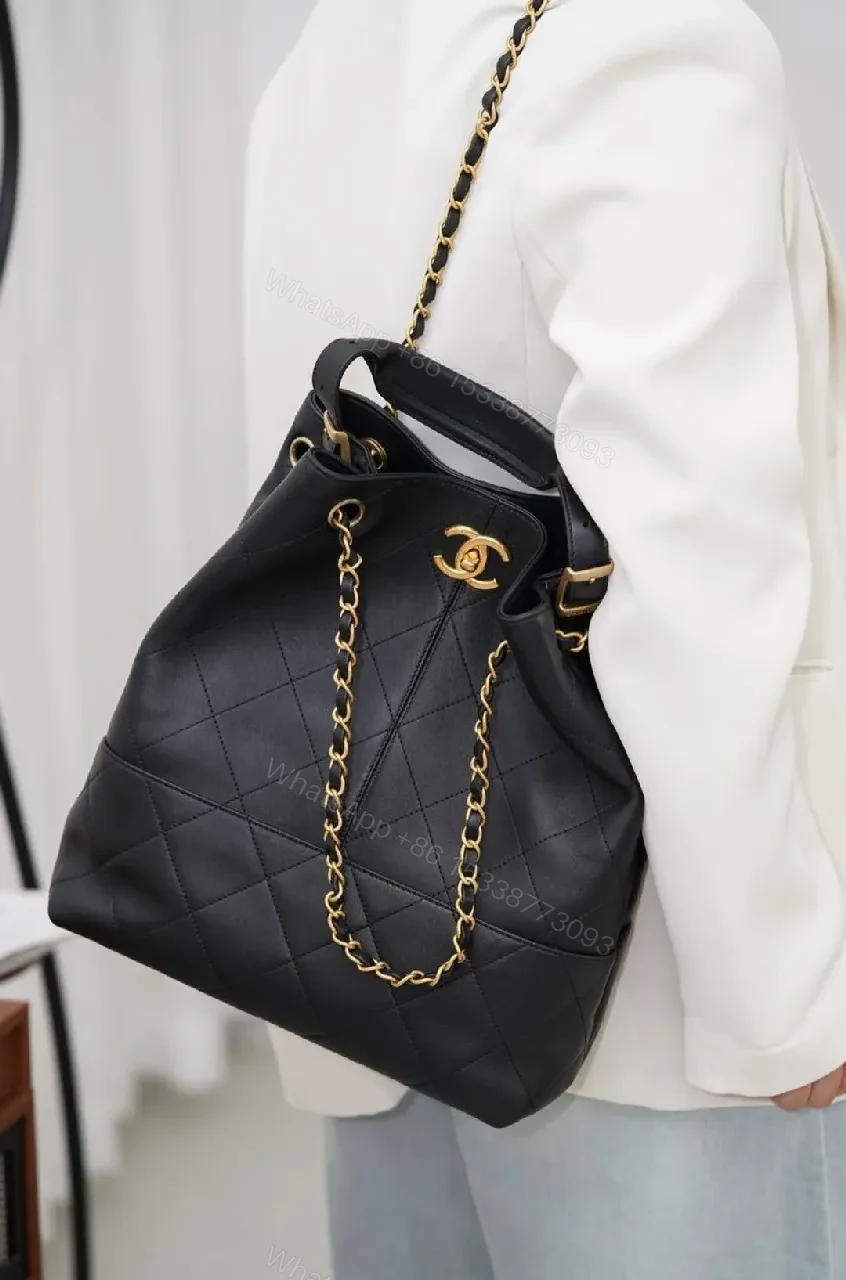 View 5 of Black Quilted Bucket Bag with Gold Chain Strap
