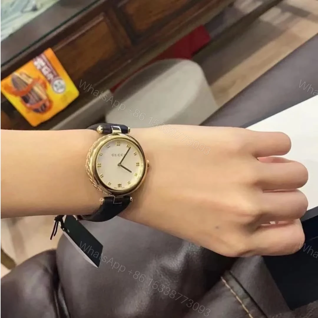 View 5 of Gucci Diamantissima Swiss Quartz With Black Strap And Gold Tone 27Mm Ya141404