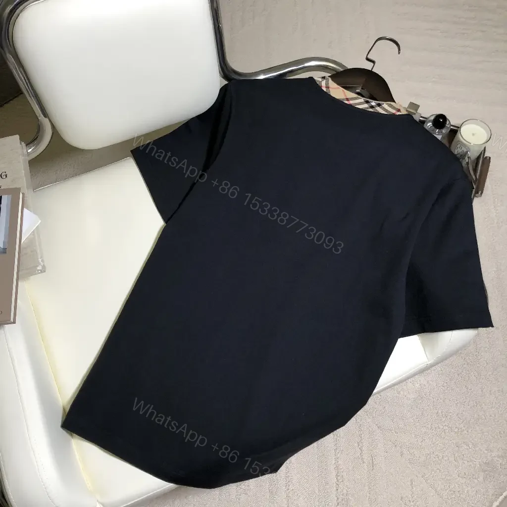View 4 of Solid Black Short-Sleeve Tunic with Plaid Collar