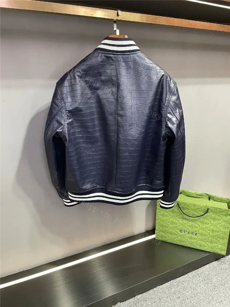 View 7 of Bold Navy Quilted Varsity Jacket with LV-Inspired Logo