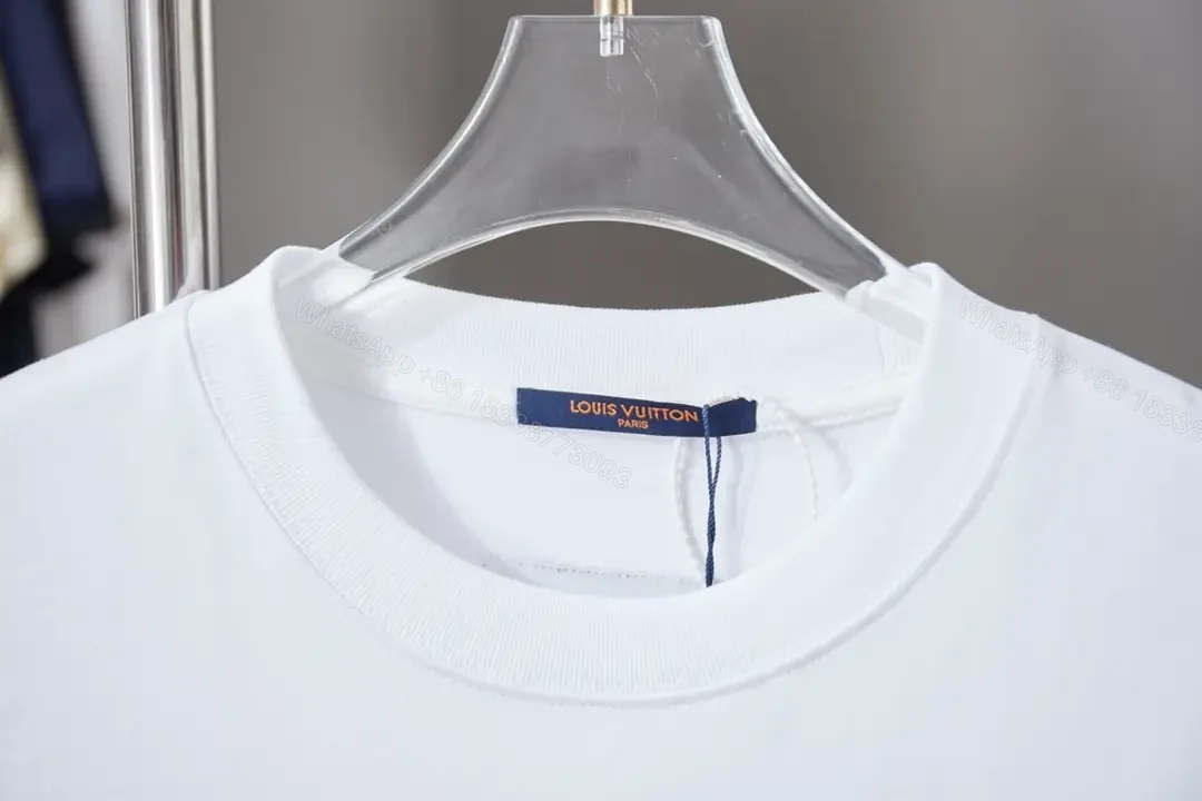 View 10 of Minimalist White Tee with LV Stitch – Premium Everyday Essential