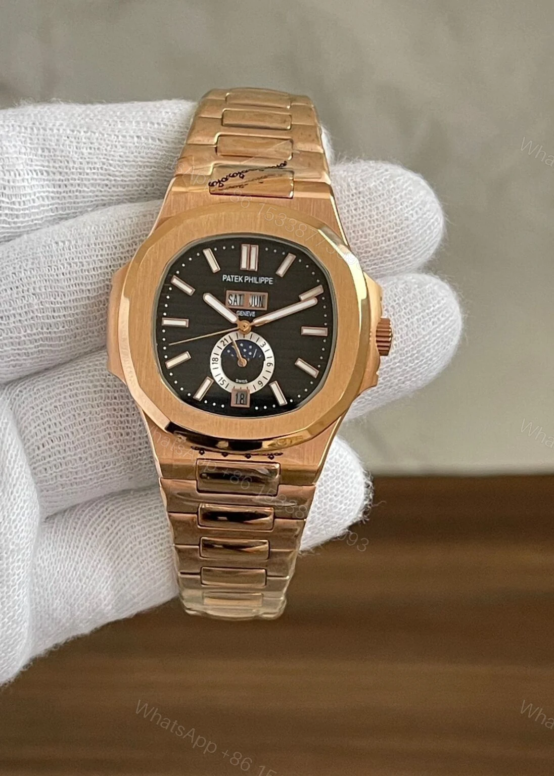 View 2 of Patek Philippe Nautilus White Sun Moon 40MM Automatic